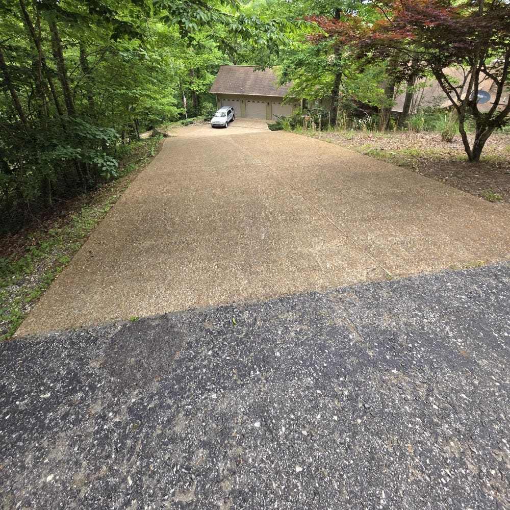 Steep Driveway Going Down to a House
