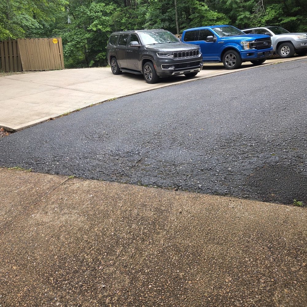 Top of a Steep Driveway with Cars Parked