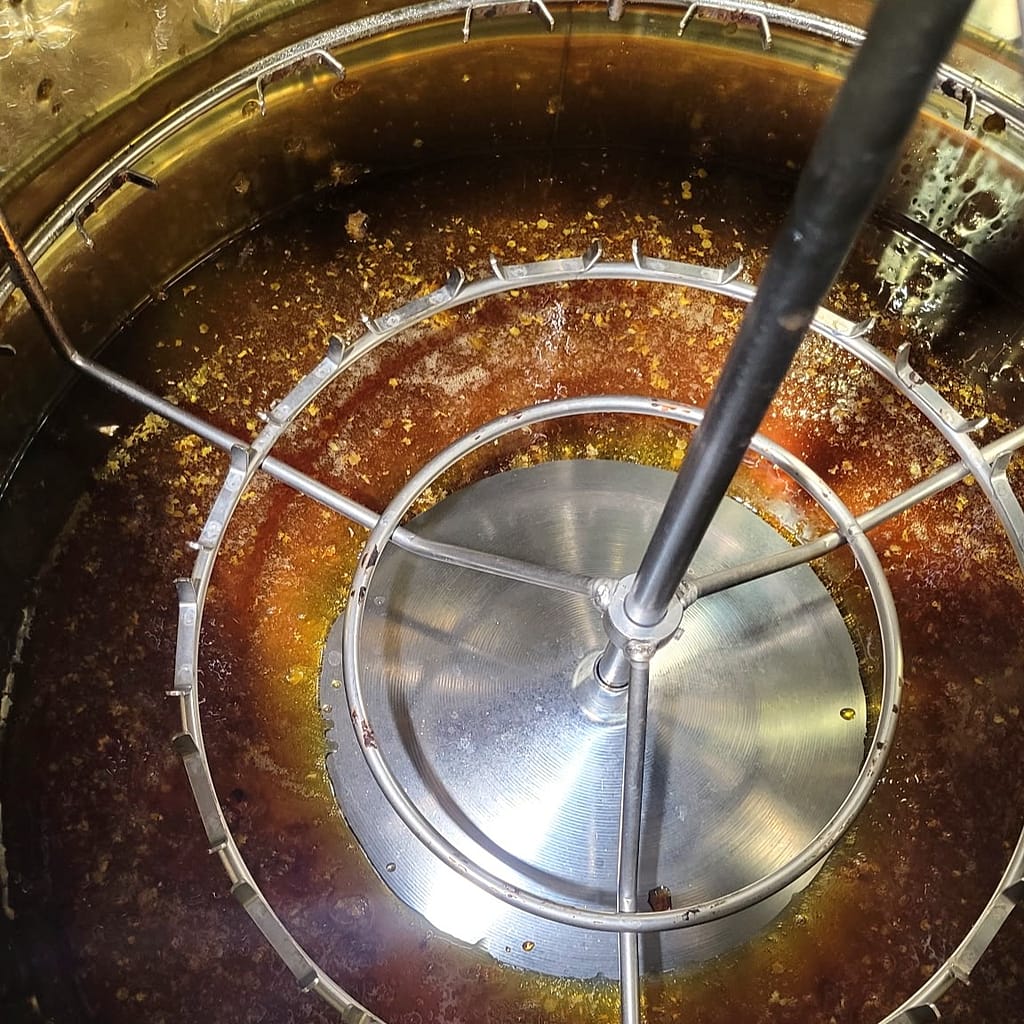 Honey Being Processed in a Pot