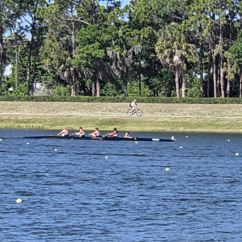 Crew of 4 Rowing in a Regatta on a Lake