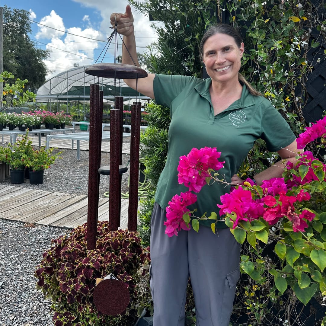 Kerby's Staff Person Holding Windchime and Bougainvillea
