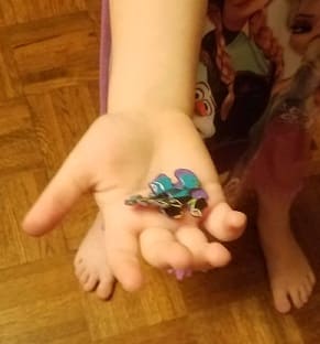 Puzzle Piece in a Hand