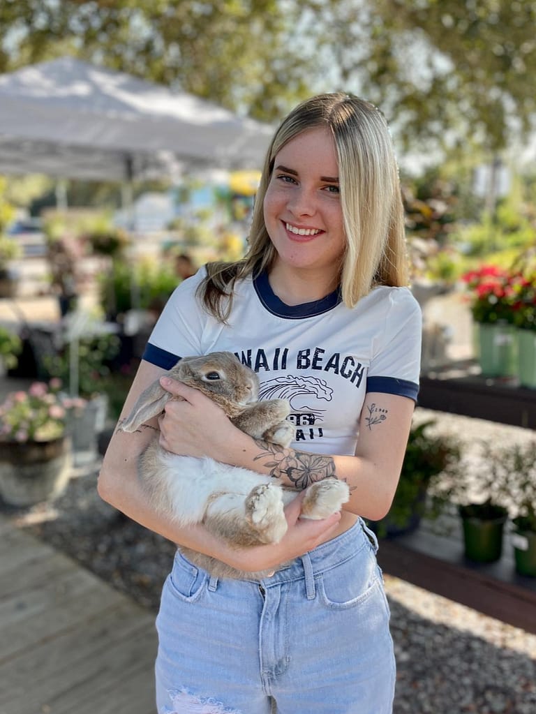 Girl with Rabbit at Kerby's Nursery Plants & Pets Event