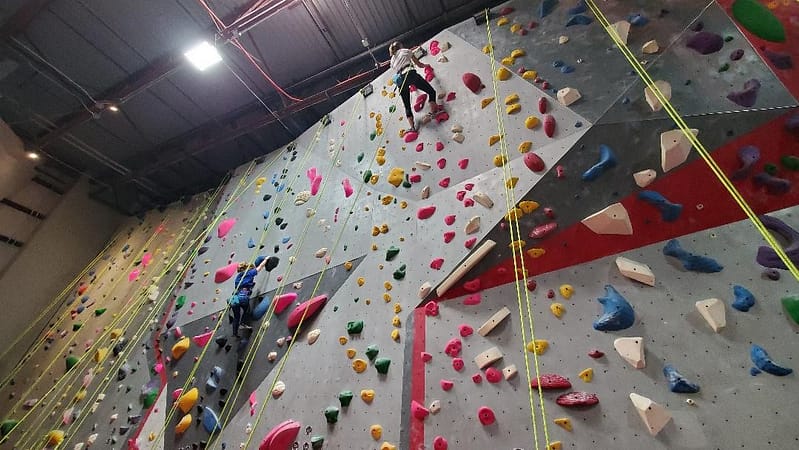 Maddy and Kim on Rock Climbing Wall