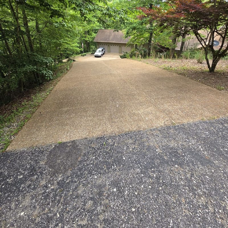 Steep Driveway Going Down to a House