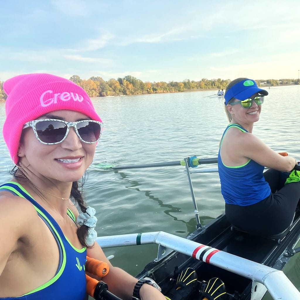 Kim and Her Rowing Partner in a Boat