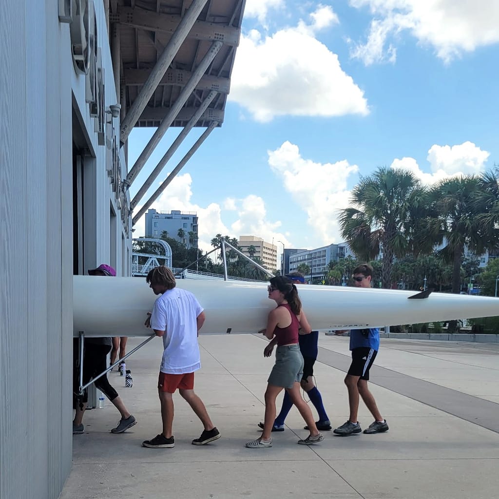 Kerby's Staff Carrying a Boat after Rowing