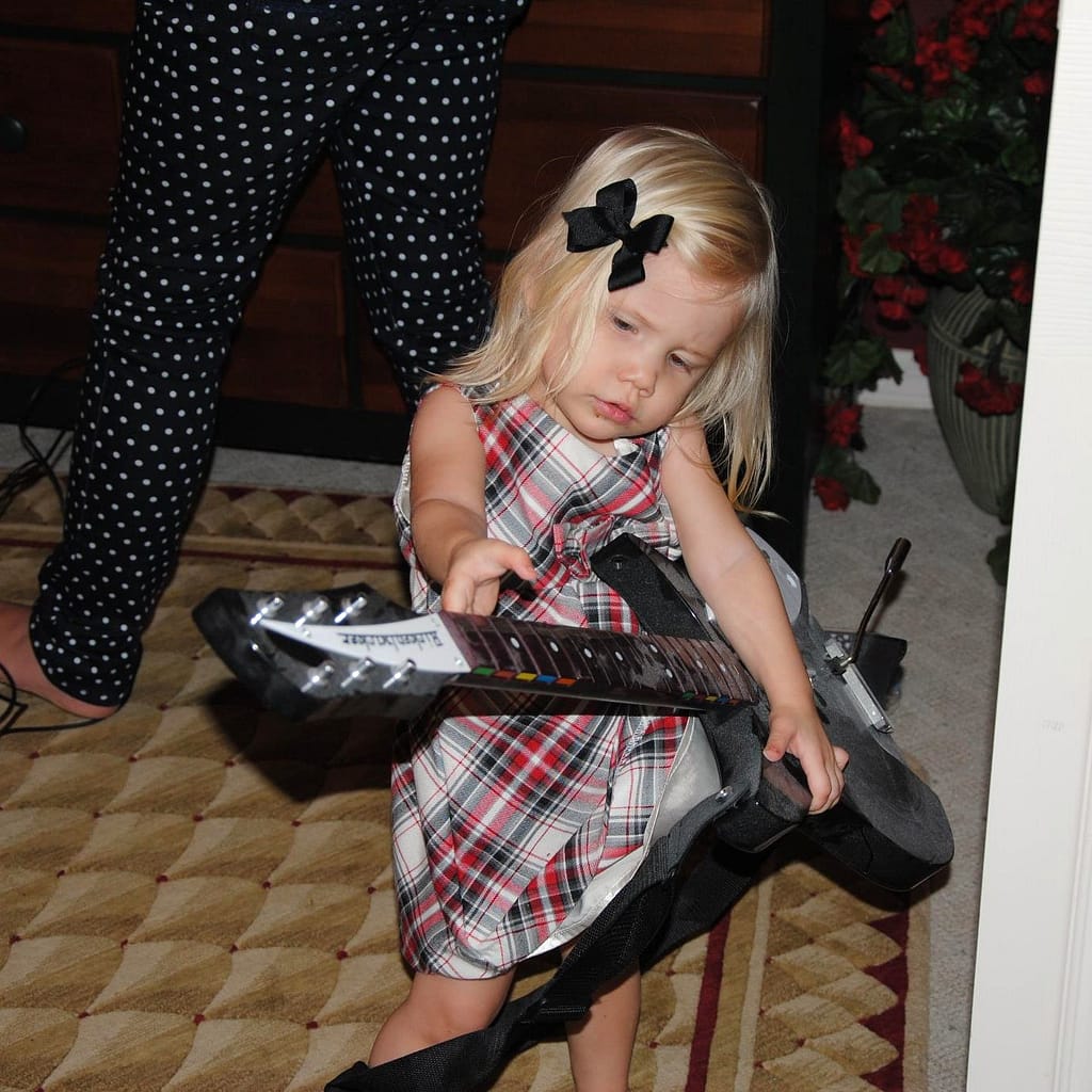 Abby Playing with Rock Band Video Game Guitar