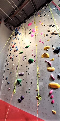 Maddy at the Top of the Rock Climbing Wall