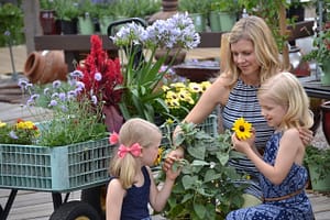 Maddy, Abby, and Kim with flowers