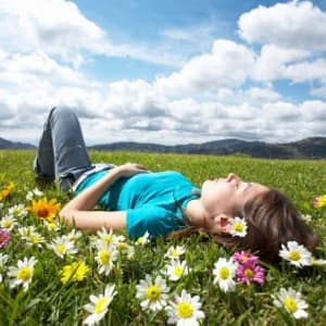 Girl Laying in a Meadow