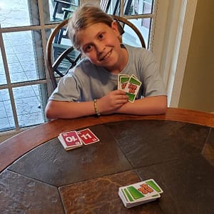 Maddy playing Skip-Bo™