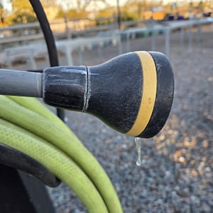 Hose with Icicle Dripping from It