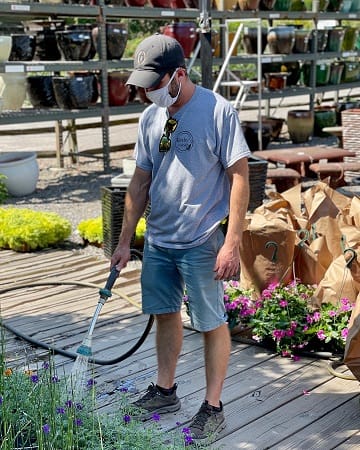 Man Watering Plants