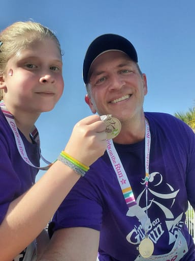 Joey and Maddy with their medals