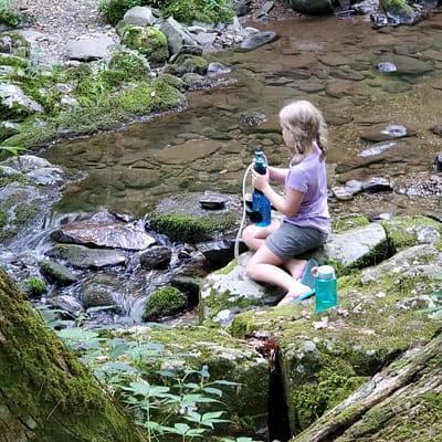 Maddy Pumping Water