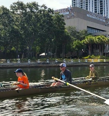 Joey, Maddy, and Abby (Dad and 2 Daughters) Rowing a Boat