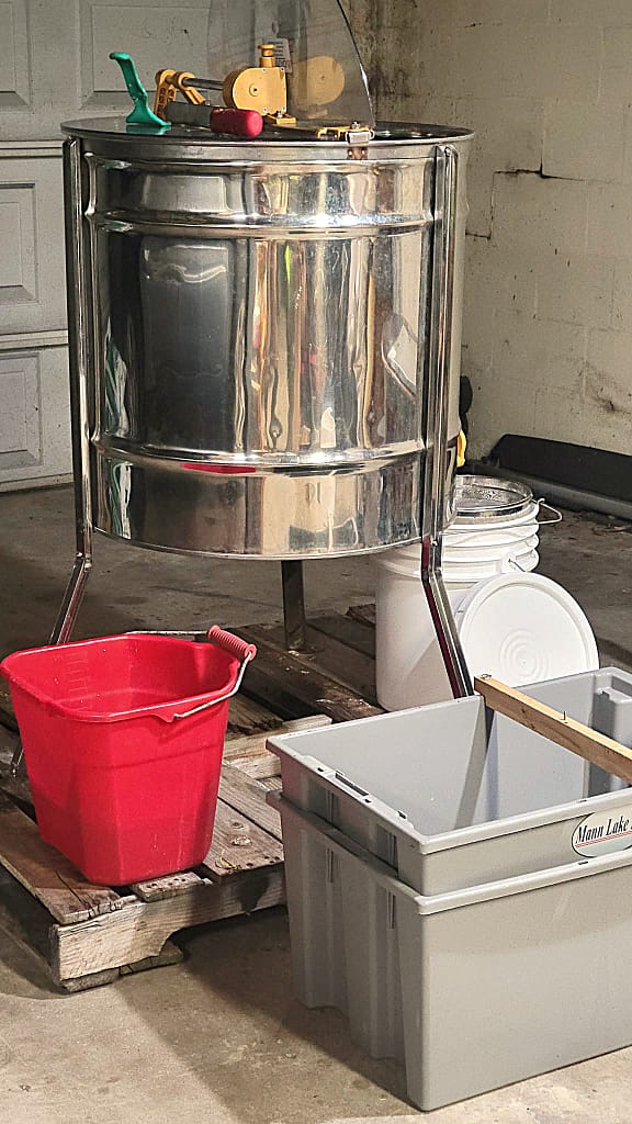 Pot and Buckets to Process Honey from a Beehive