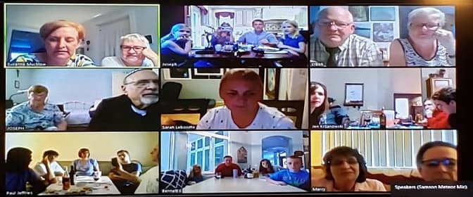 Family Having a Seder Meal Over Zoom