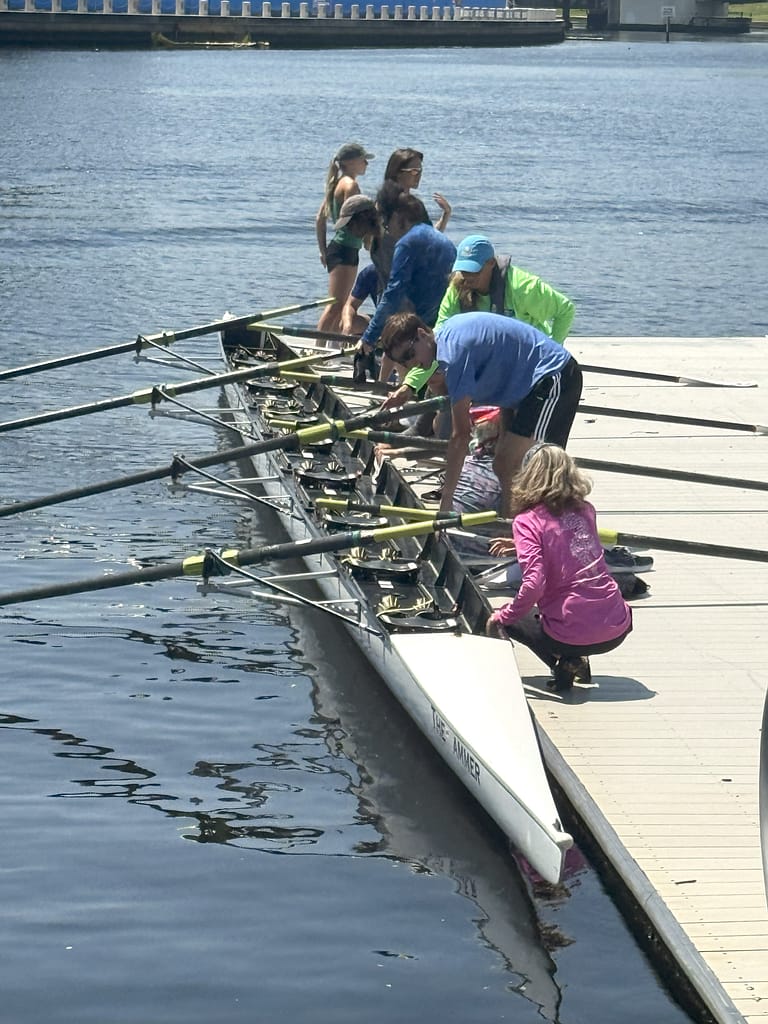 Kerby's Staff with Crew Boat at Dock