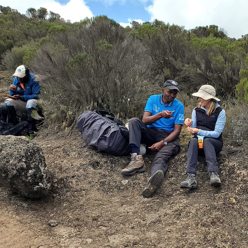Kim and Others Enjoying a Snack on a Mt. Kilimanjaro
