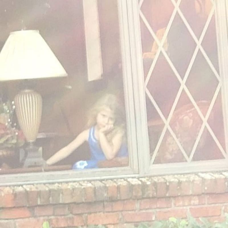 Little Girl (Maddy) Looking Out the Window