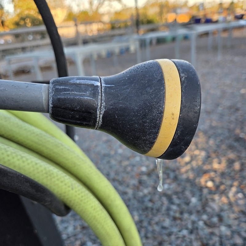 Hose with Icicle Dripping from It