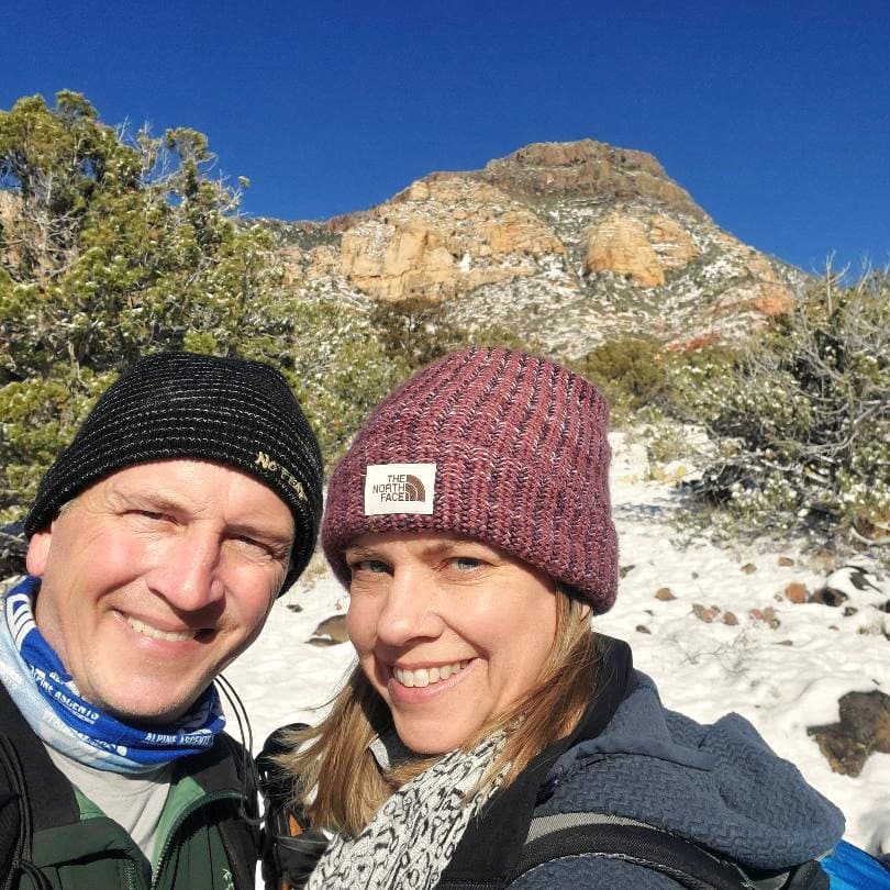 Joey and Kim Hiking in the Snow with Mt. Wilson Behind Them (Sedona, AZ)