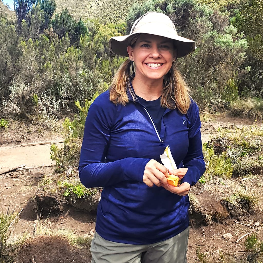 Kim Snacking on the Mt. Kilimanjaro Trail