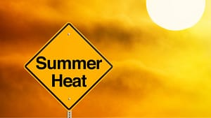 Sign saying "Summer Heat" in the Sun