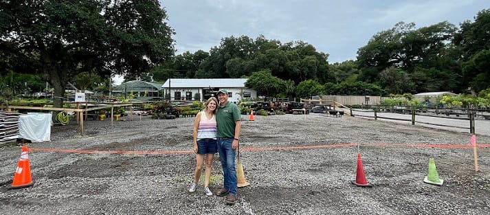 Kim and Joey in Front of Farmhouse Construction