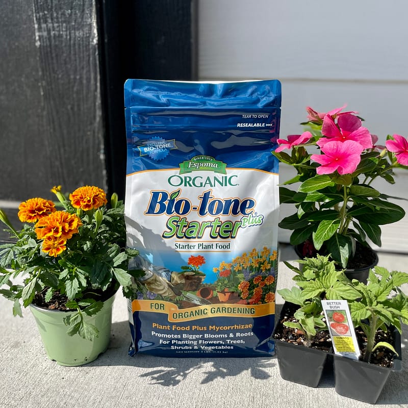 Bag of Espoma Organic® Bio-tone® Starter Plus Fertilizer with plants
