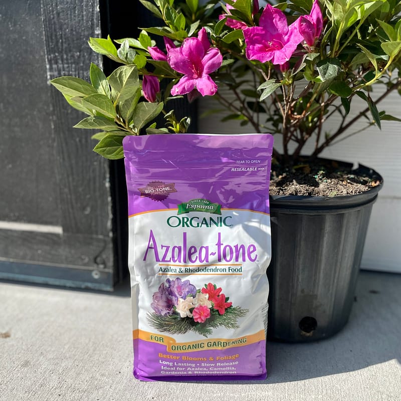 Bag of Espoma Organic® Azalea-tone® Fertilizer with plants
